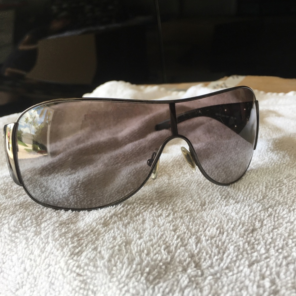 Prada black sunglasses with black lenses